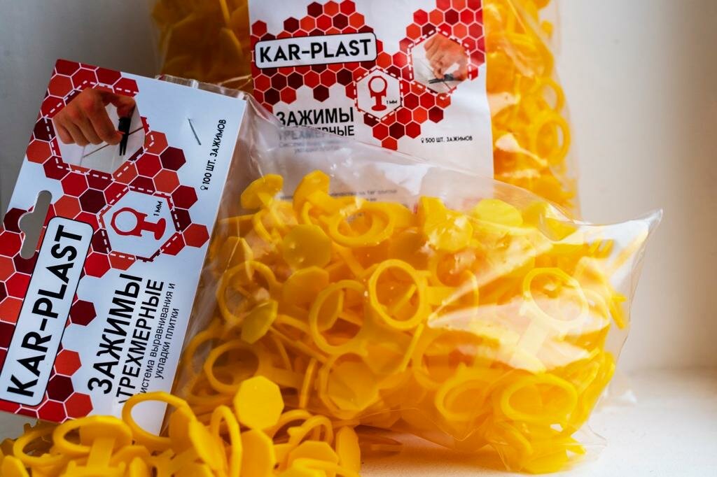 фото Зажимы трехмерные с кольцом для выравнивания и укладки плитки СВП Kar-Plast (100шт) 1 мм (желтый)