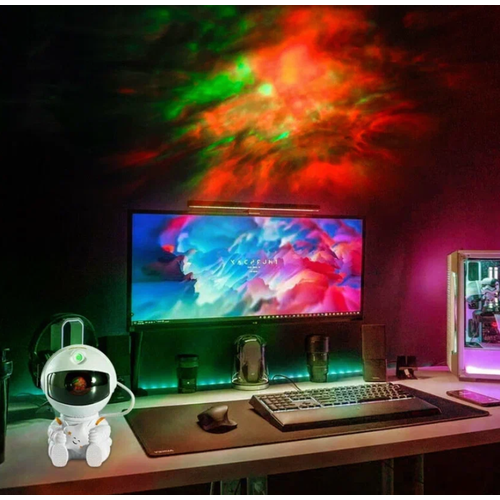 Ночник проектор звездного неба космонавт сидячий астронавт для комнаты 749₽