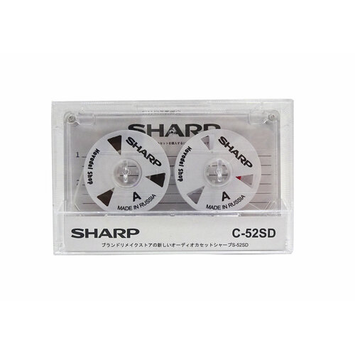 Аудиокассета "SHARP" с белыми боббинками с 3 окнами третий вариант