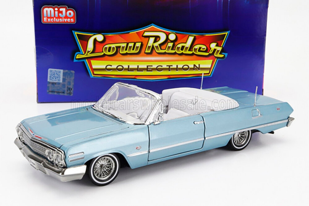 Модель коллекционная WELLY Chevrolet impala cabriolet open low rider (1963), light blue met