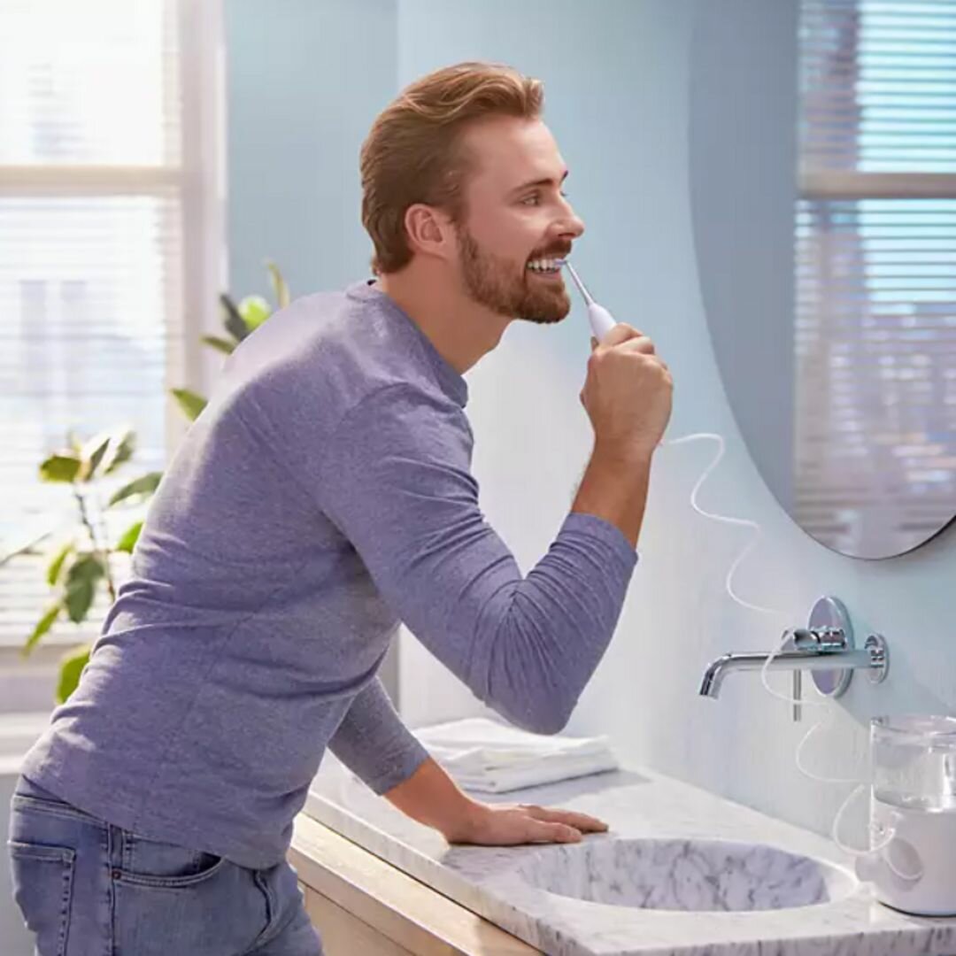 Ирригатор Philips HX3911/40, 2х2 насадки, пульсирующий принцип работы, 600 мл резервуар для воды, белый — фото 1