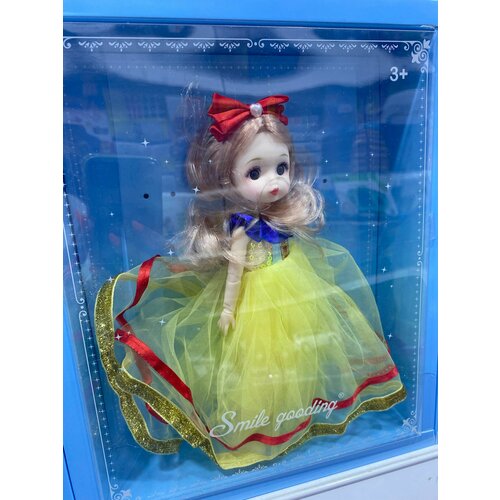 Кукла шарнирная в желтом платье с бантом - 25 см