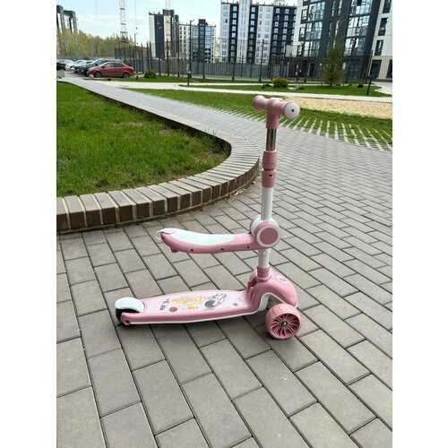 Самокат детский трехколесный со светящимися колесами и музыкой розовый 3499₽