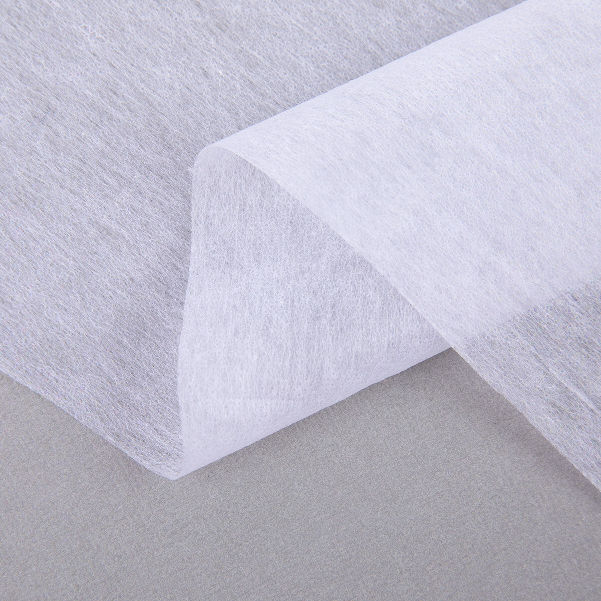 фото Нетканный материал (флизелин) "Гамма" клеевой сплошной G-520c 30 г/кв. м ± 2 100 см х 100 см белый