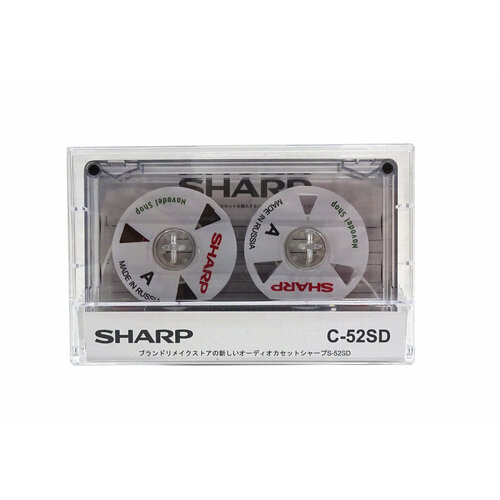 Аудиокассета "SHARP" с белыми боббинками с 3 окнами второй вариант