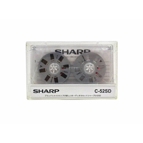 Аудиокассета SHARP с серебристыми боббинками аудиокассета sharp с белыми боббинками с 3 окнами второй вариант