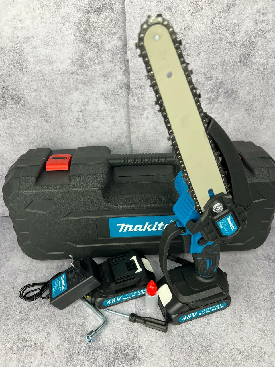 фото Аккумуляторная цепная пила 18v