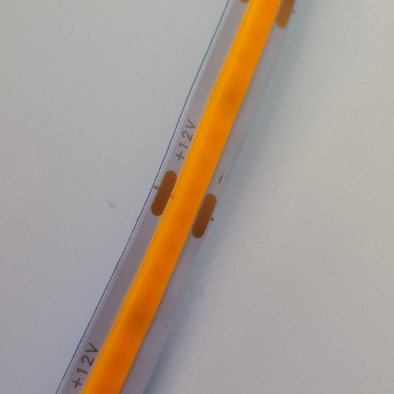 Лента светодиодная COB 12В 8В/м оранжевая, Rexant 5 метров - фотография № 3