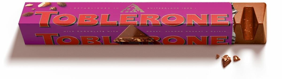 Шоколад Toblerone Молочный с медово-миндальной нугой с изюмом и орехом, 3 шт. х 100 гр. (Швейцария) — фото 1