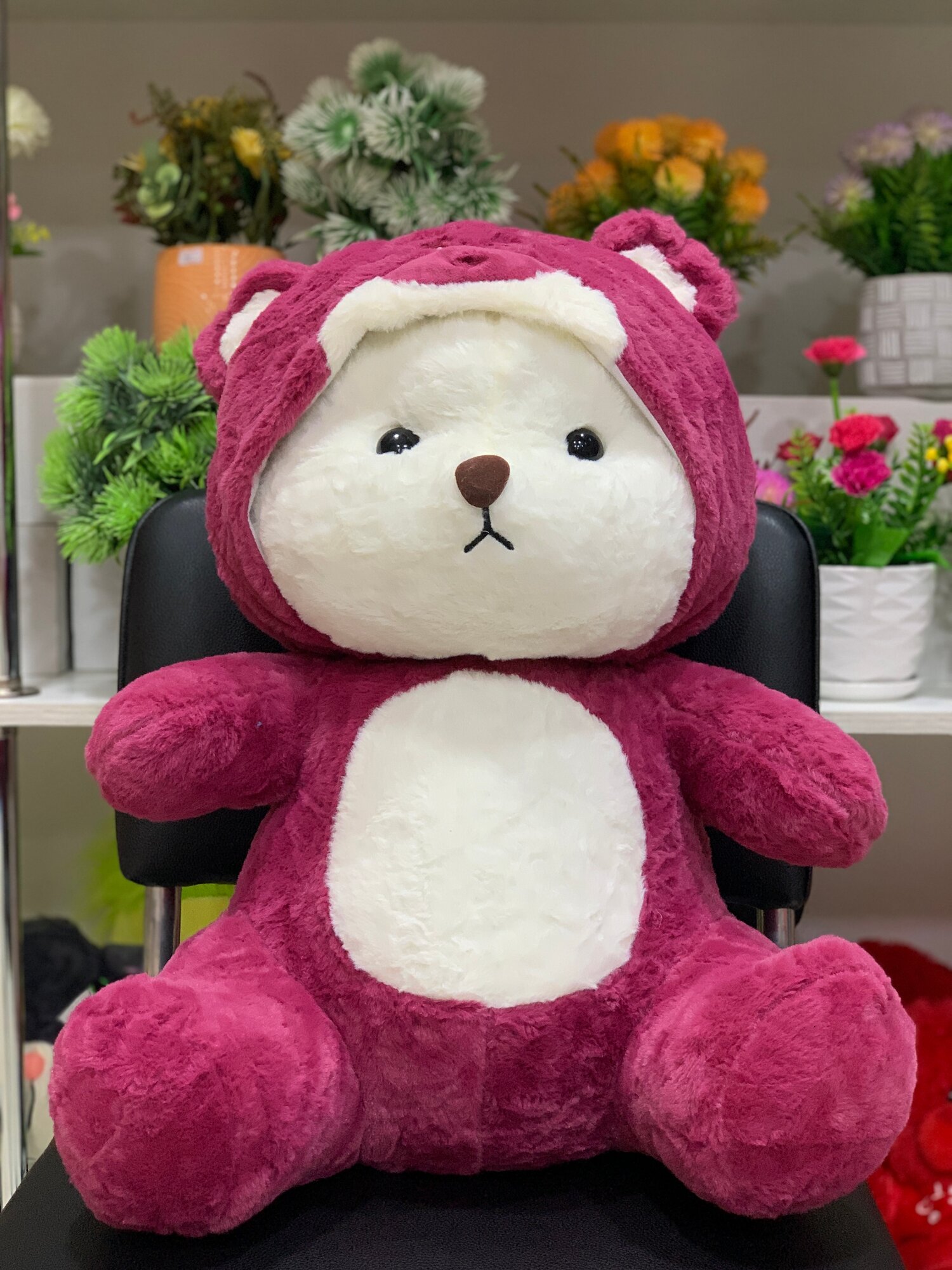 Мягкая игрушка "Медведь с капюшончиком в виде Лотсо", плюш, малиновый