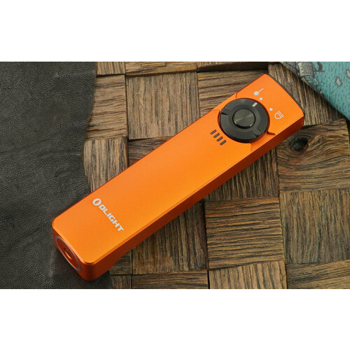 Ручной фонарь с лазерным целеуказателем Olight Arkfeld ( Orange) CW ручной фонарь olight baton 3 cu premium edition eternal 1 х 16340 диод luminus sst 40 166 метров 1200 люмен комплект