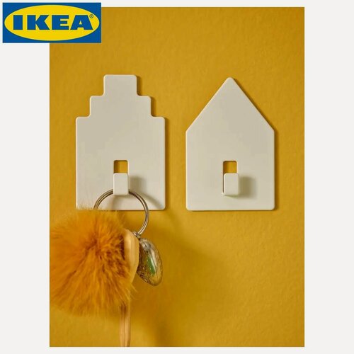 Изображение товара IKEA Крючок самоклеящийся TIPPVAGN дом/белый