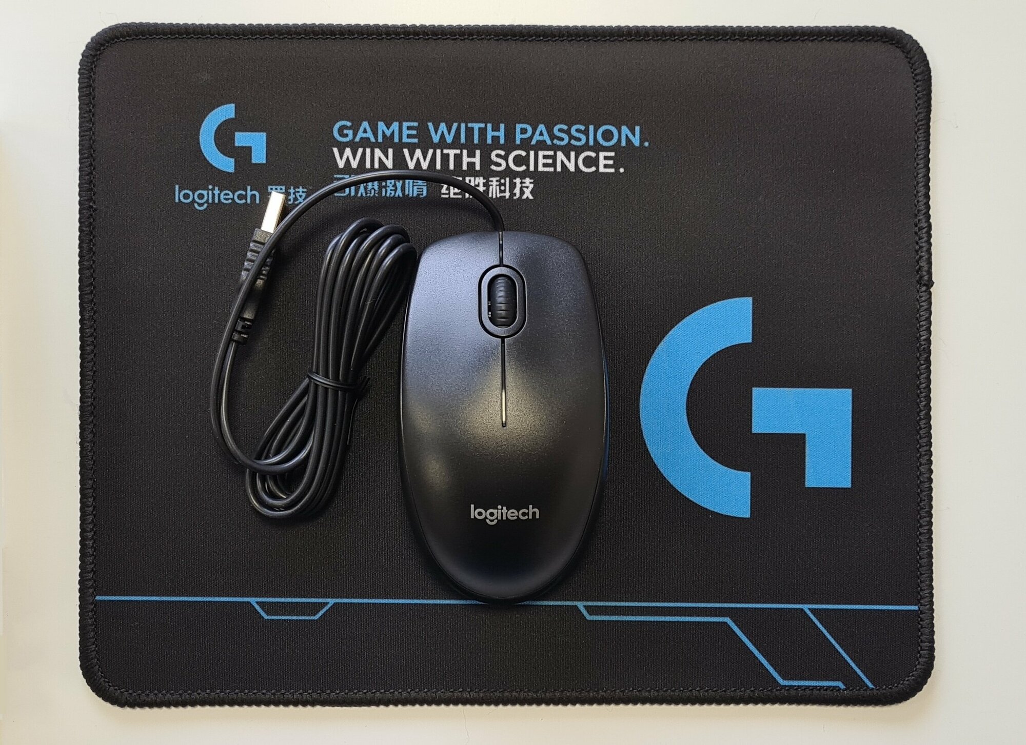 Комплект: Мышь Logitech B100 (черная) + Коврик 260 X 210 X 3мм.