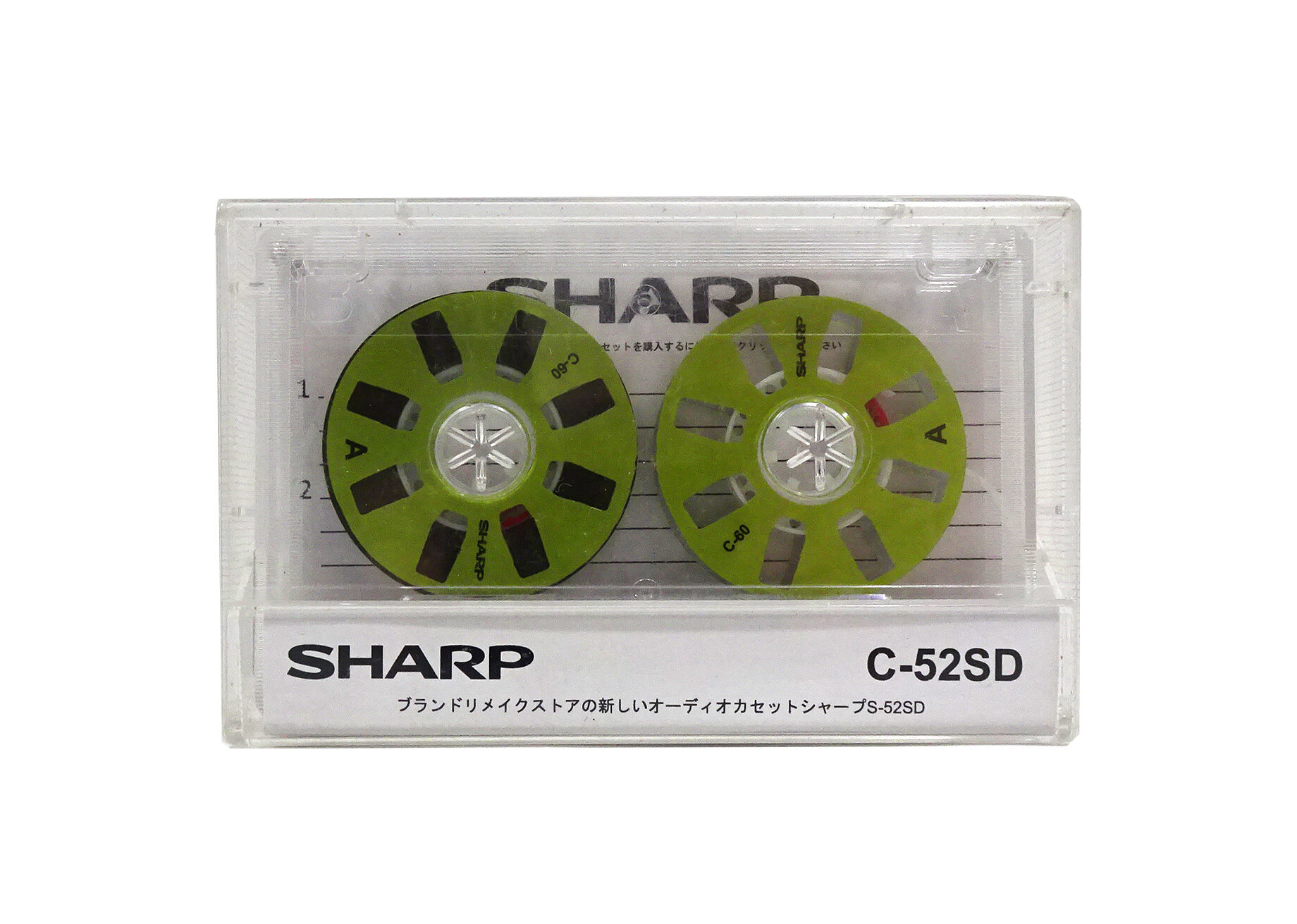 Аудиокассета "SHARP" c зелёными боббинками