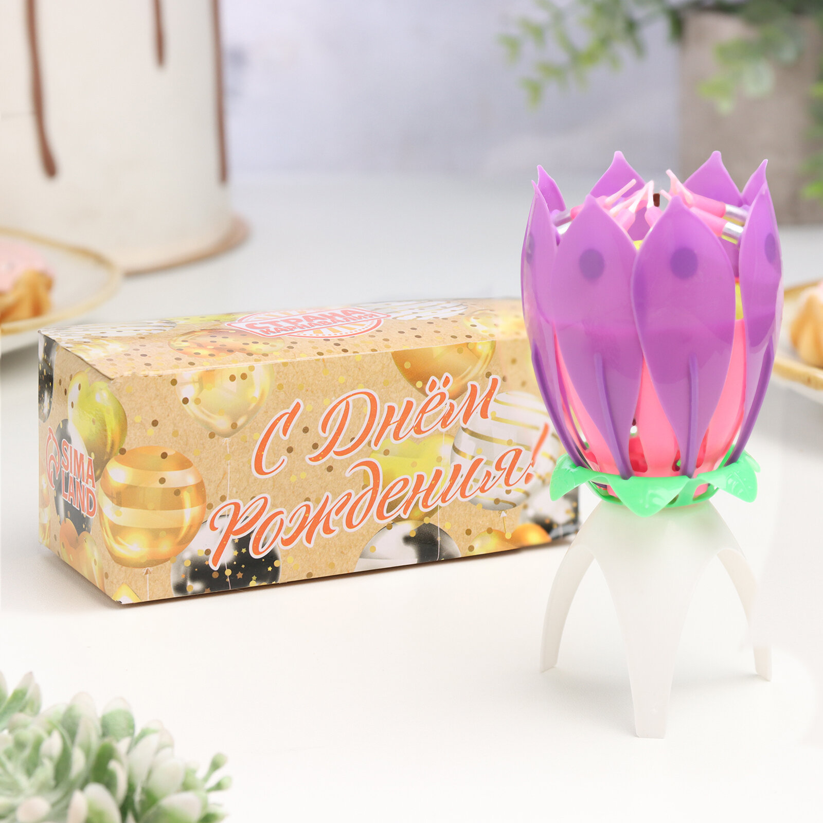 "Музыкальная свеча Тюльпан" - фиолетовый цветок на вашем праздничном торте!