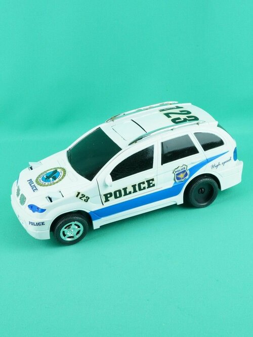 Полицейская машина со светом и звуком 28 см.