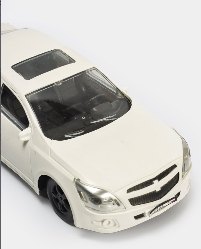 Машинка игрушка Chevrolet Cobalt LTZ пластмассовая 1+ — фото 1