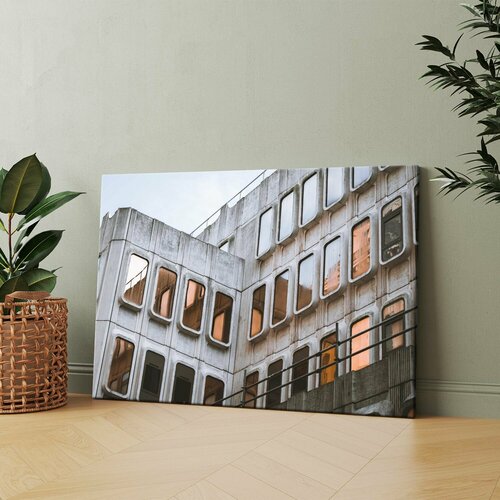 Картина на холсте (Здание с множеством окон и фоном неба) 40x60 см. Интерьерная, на стену.