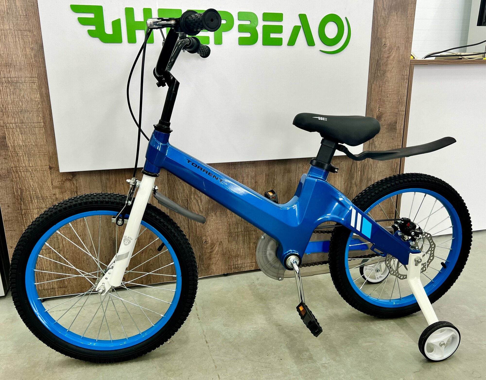 Детский велосипед TORRENT Galaxy 18 (добавочные колёса,1скорость, колеса 18", рама магниевый сплав)