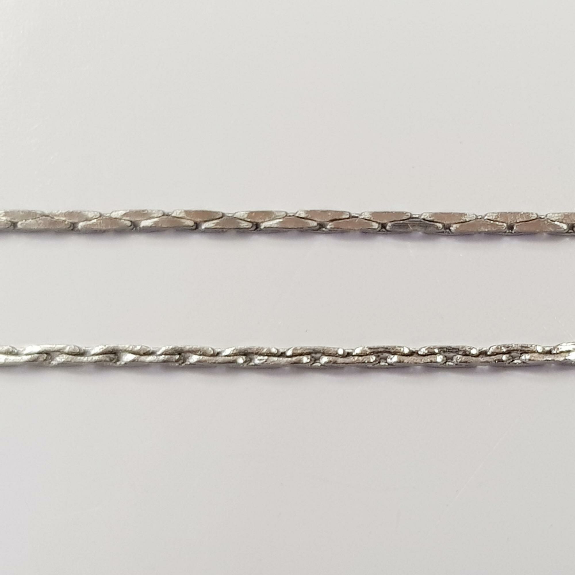 Цепочка отрезная (без замка) 0.9х0.6мм змейка прямоугольная базовый материал - латунь стального цвета 2 метра