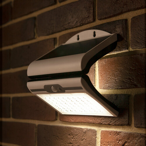 Светодиодный уличный прожектор на солнечной батарее с датчиком движения и освещенности GLANZEN FAD-0500-1800-solar с подсветкой фасадов и стен