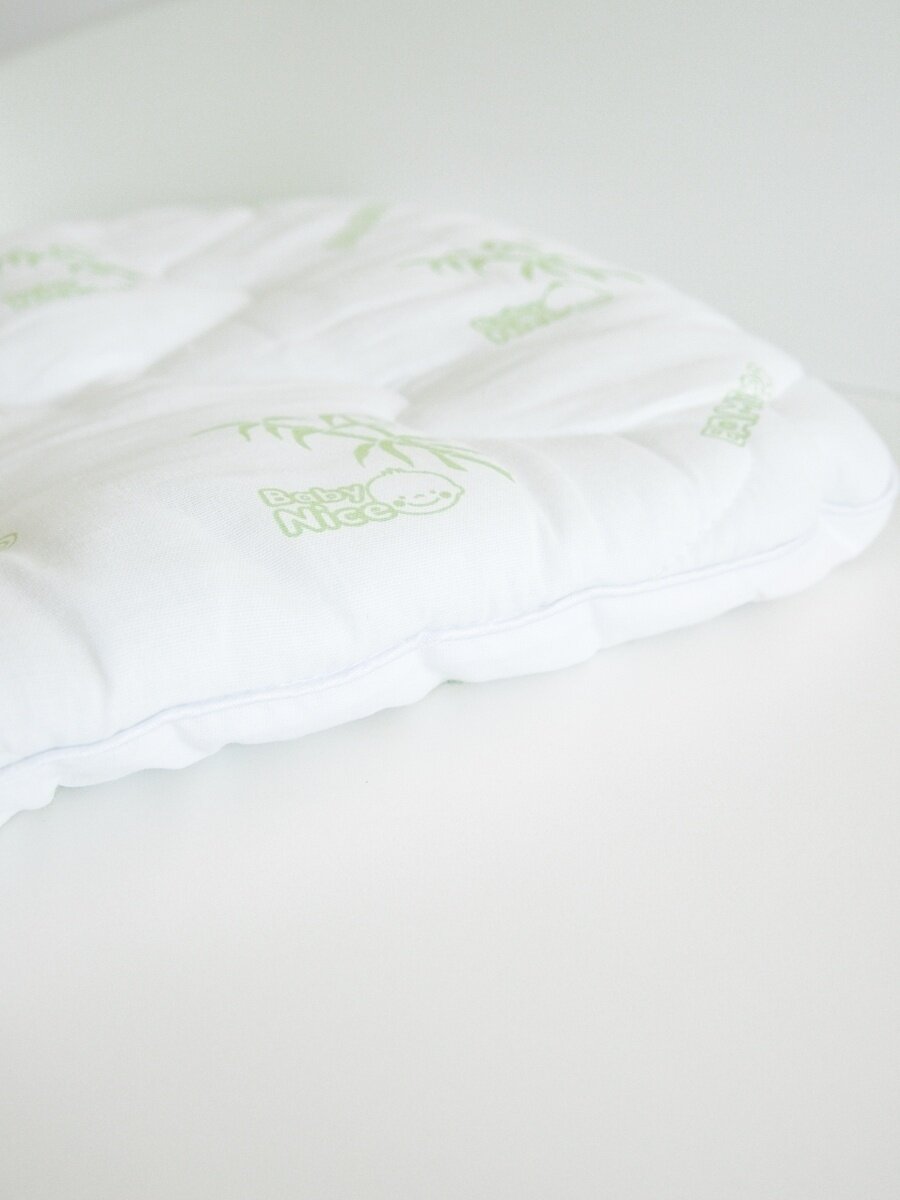 фото Детская подушка 40х60 в кроватку новорожденного, бамбук