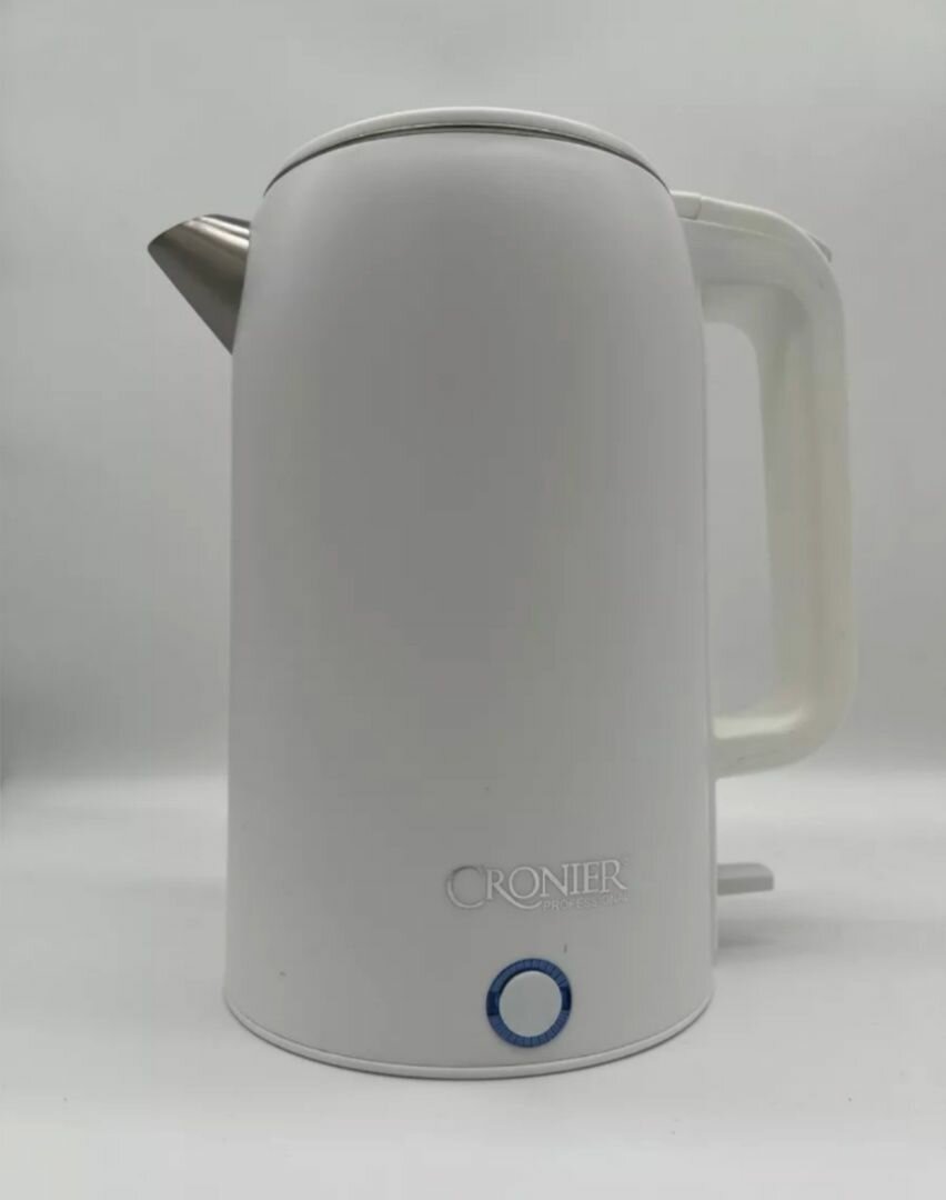 фото Электрический чайник для приготовления горячих напитков. Белый