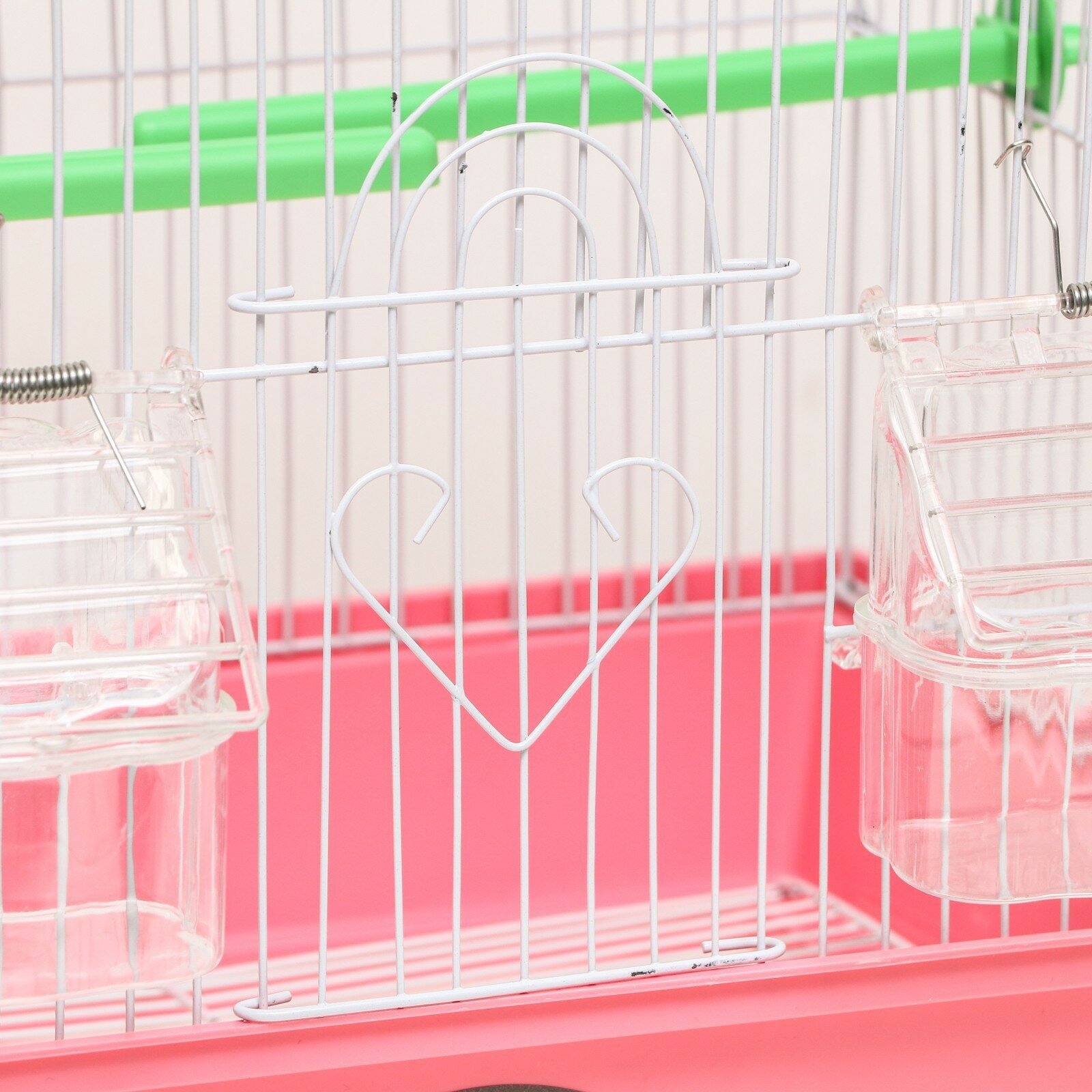 Клетка для птиц овальная с кормушками, 30 х 23 х 39 см, розовая - фотография № 4