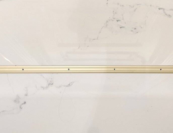 фото Накладка на ступени (внешний угол) 24/10шампань