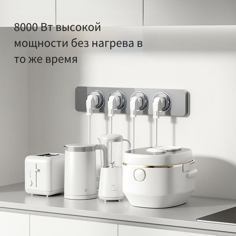 Распаковка умной розетки Mijia: коробка, устройство, документы на белом фоне