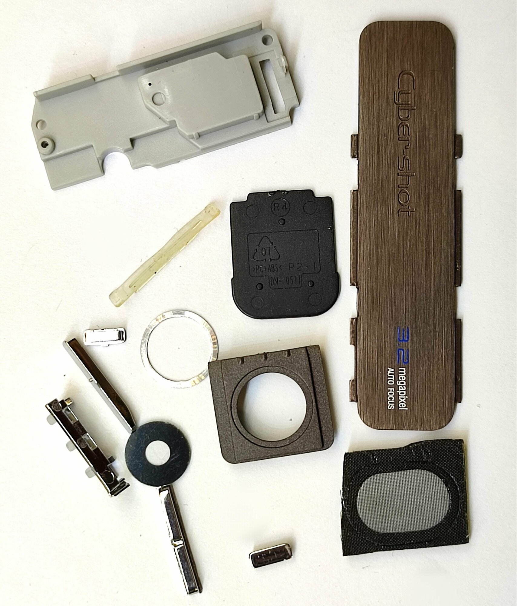 Комплект боковых кнопок. Толкатель кнопки включения громкости  для телефона Sony Ericsson k770i (кнопки часть корпуса) + стекло камеры