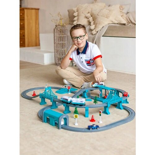 фото Большая игрушечная железная дорога "мой город, 104 предмета", на батарейках со светом и звуком (бирюзовая) g211-019 givito