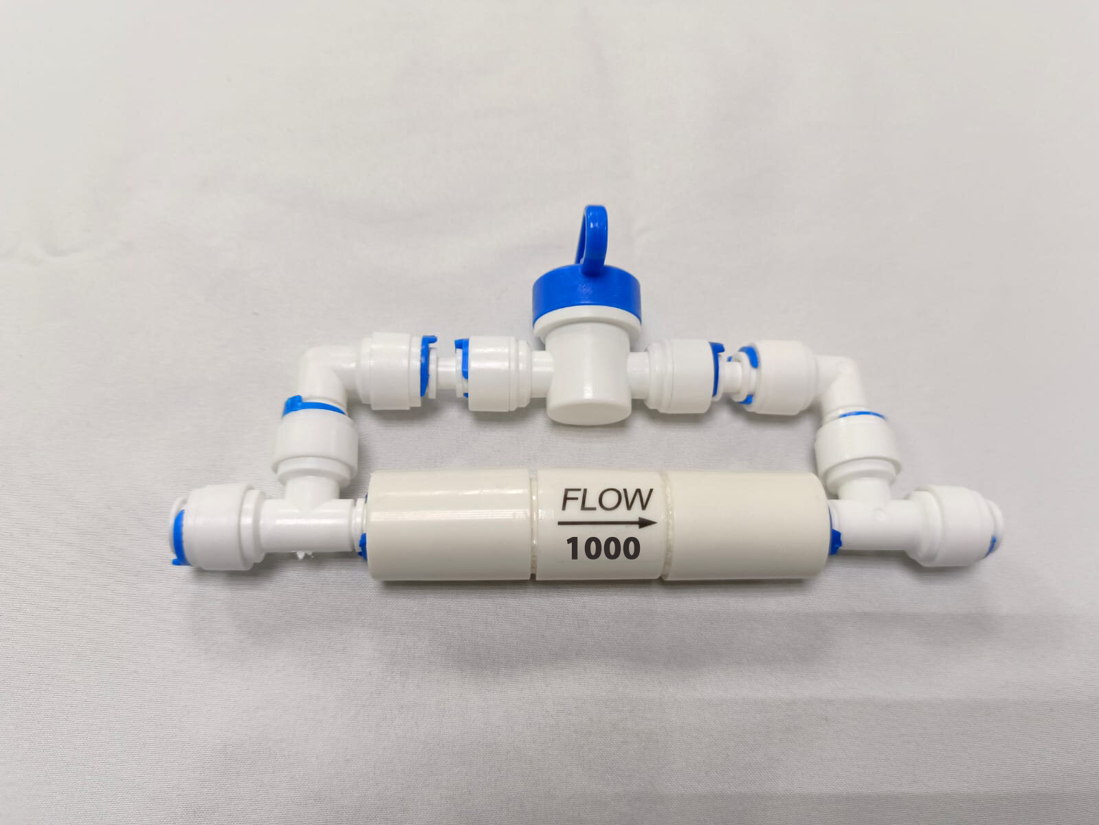 фото Ограничитель потока 1000 мл/ мин (контроллер дренажа, рестриктор) для фильтра обратного осмоса Гейзер, Барьер, Unicorn, UFAFILTER 1/4" с ручной промывкой мембраны