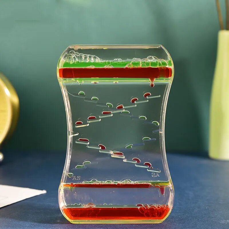 фото Антистресс жидкие часы/ Гелевые песочные часы цвет Красно-зеленый размер высота 14см ширина 9см глубина 3,5см материал акрил