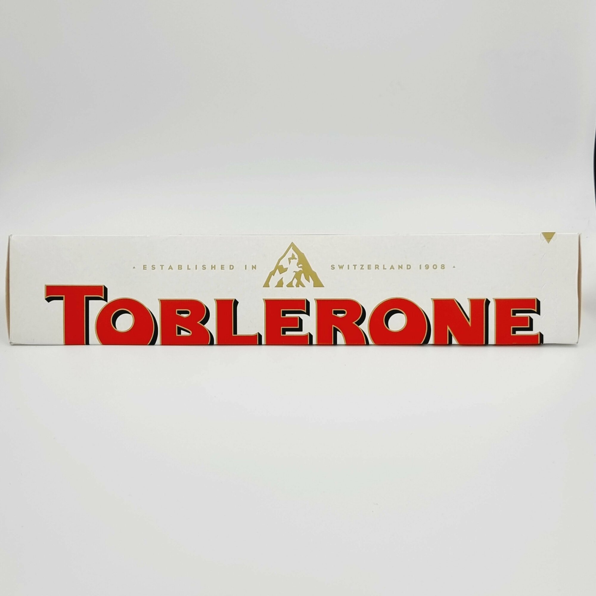 Шоколад Toblerone белый с миндальной нугой и мягким медовым вкусом 360 г (Из Финляндии)