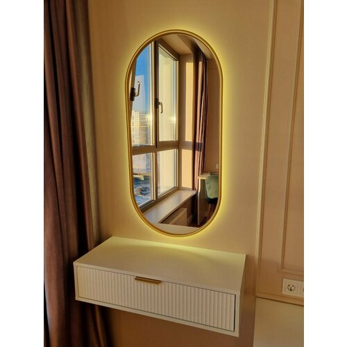 Овальное зеркало капсула в тонкой матовой золотой раме 12672 см с нейтральной подсветкой с датчиком на взмах руки 17740₽
