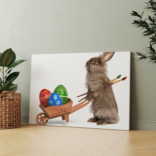 Картина на холсте Кролик толкает деревянную тележку с крашеными яйцами 20x30 см Интерьерная на стену 869₽