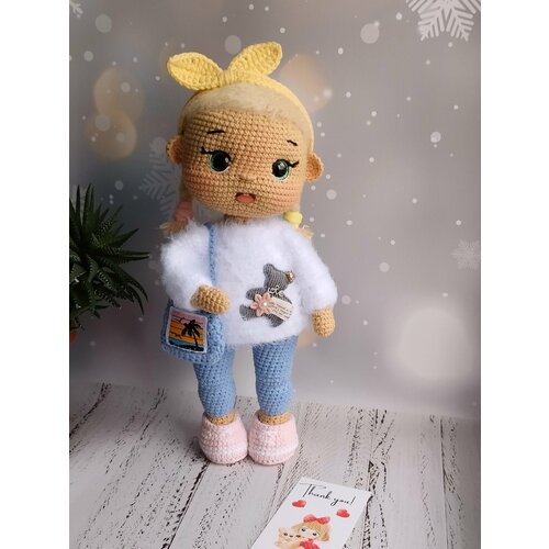 Вязаная куколка с косичками