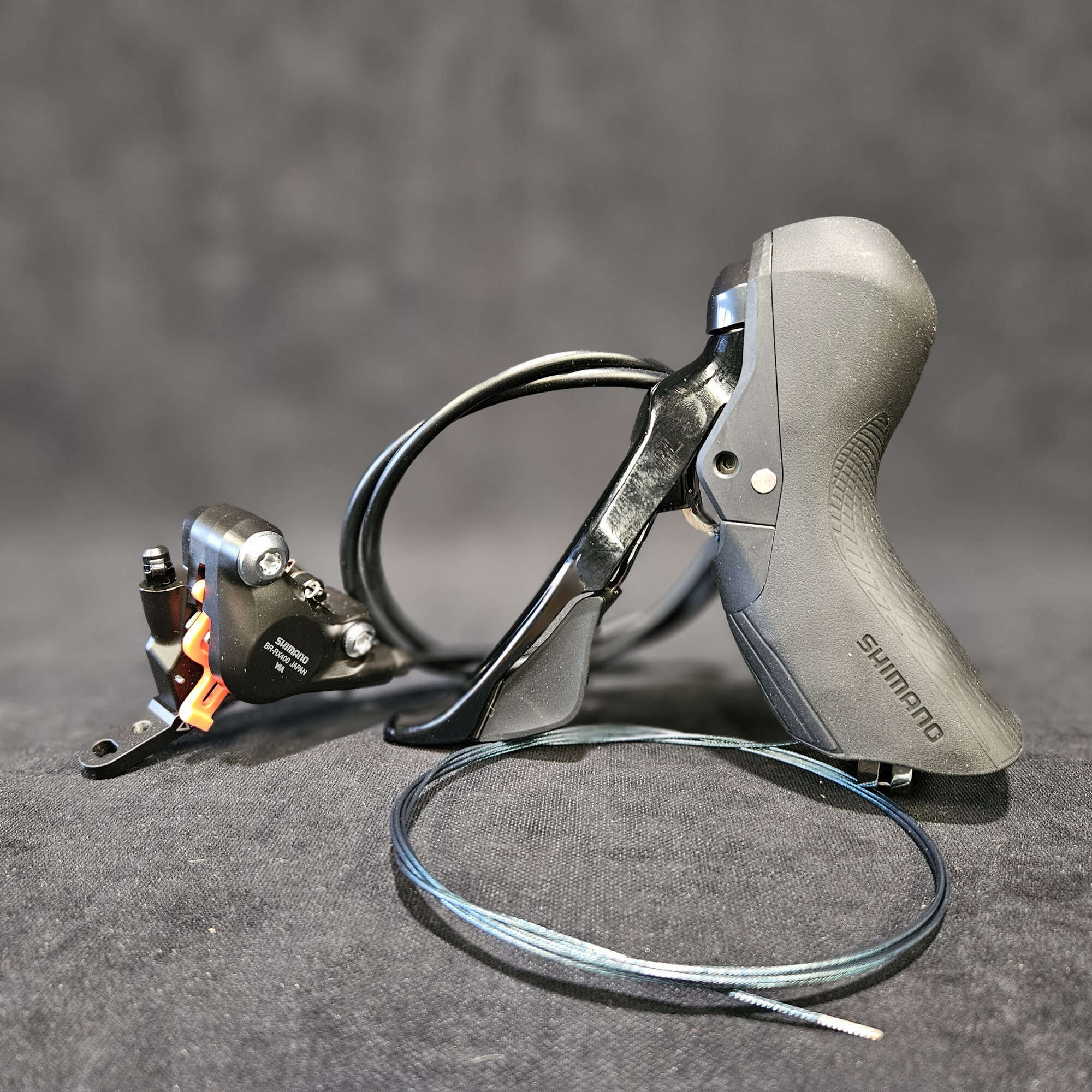 Пистолет-манетка Shimano GRX ST-RX400 (гидравлика), 2 ск, калипер GRX BR-RX400 (колодки - K05S), гидролиния 800 мм, J-kit (OEM без упаковки)