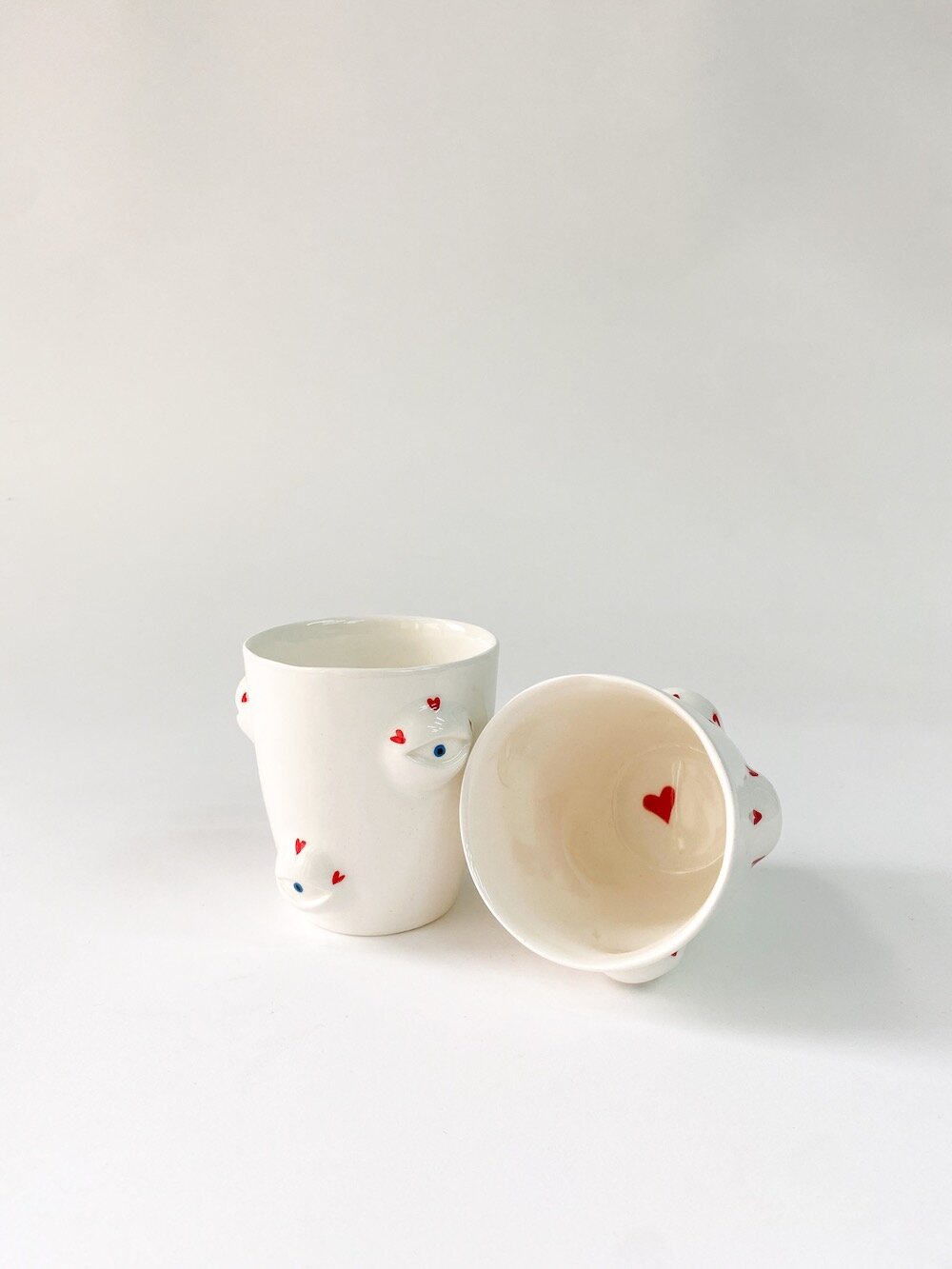Маленький керамический стакан ручной работы "Глаза" от Кати Мороз