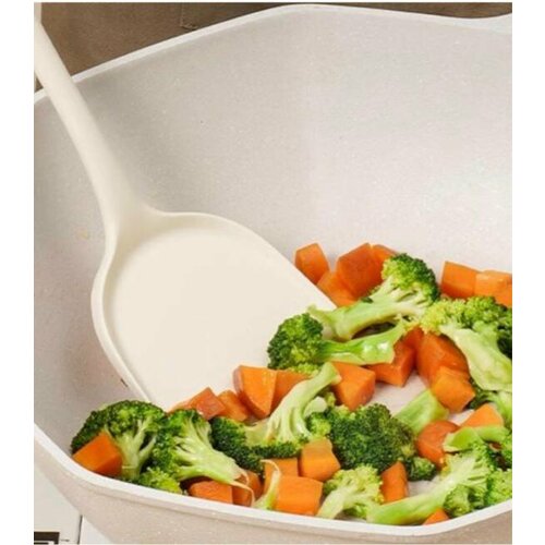 Лопатка кухонная силиконовая цельнолитая с бортиком.