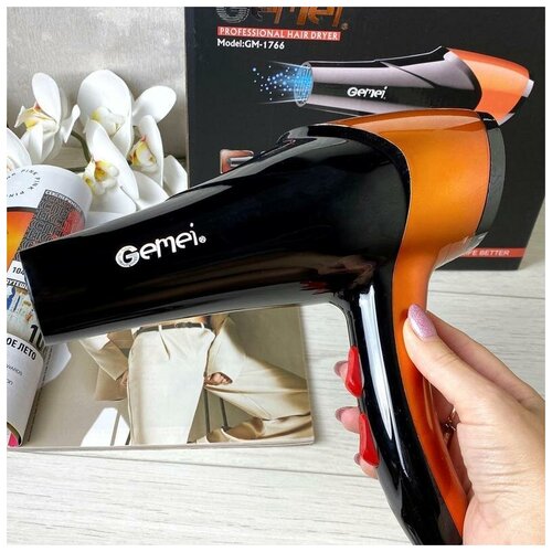 Фен для волос GM-1766 чёрно-оранжевыймощность 2600 Вт3 температурных режима2 скоростных режимаподача холодного воздухаодна насадка 139900₽