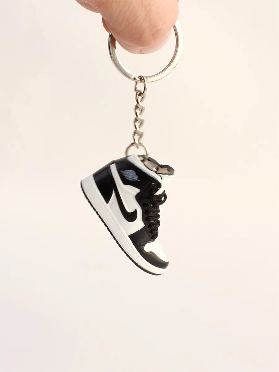 Брелок, черный, белый — фото 1