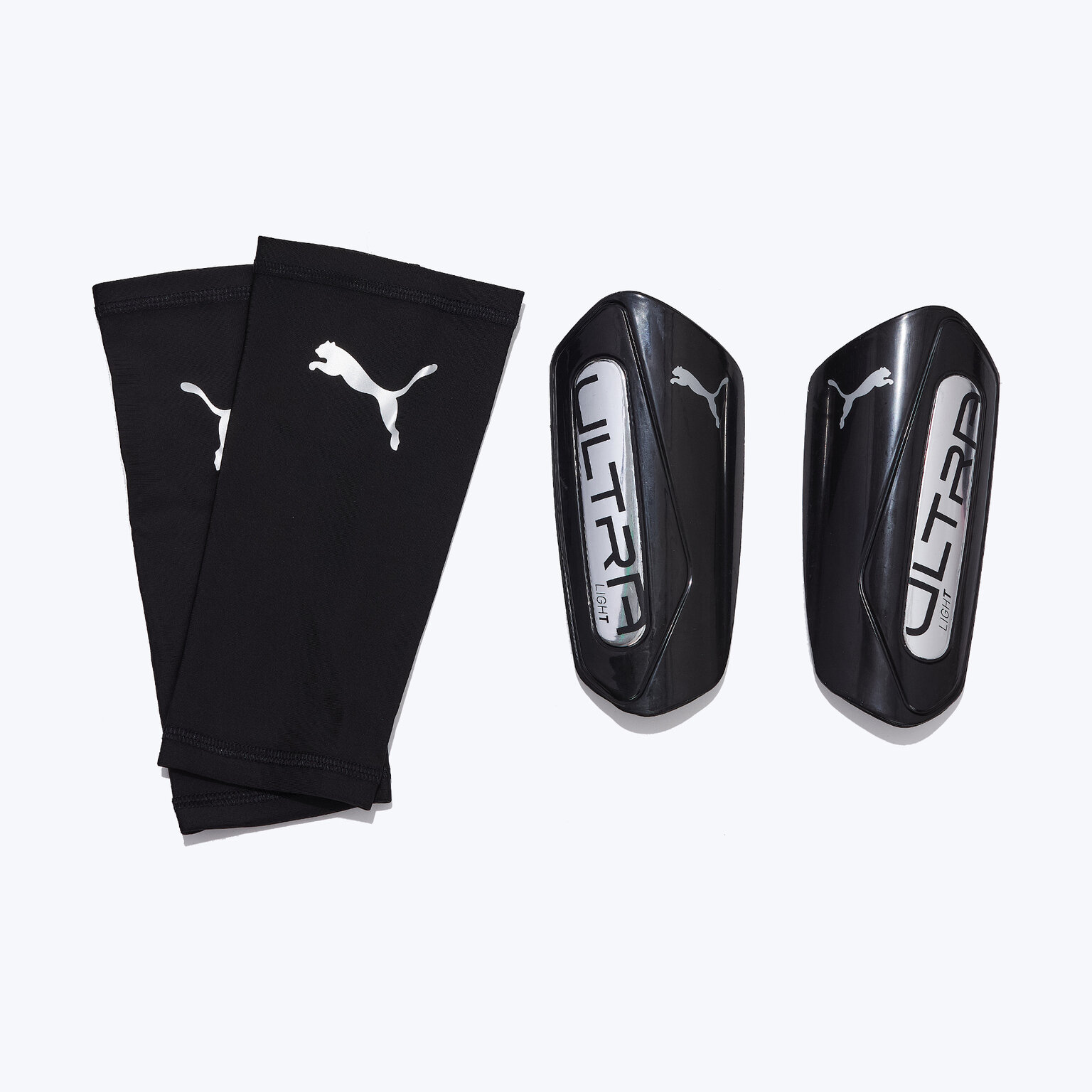Щитки Puma Ultra Light Sleeve 03098903 размер M (M Размер) Черный