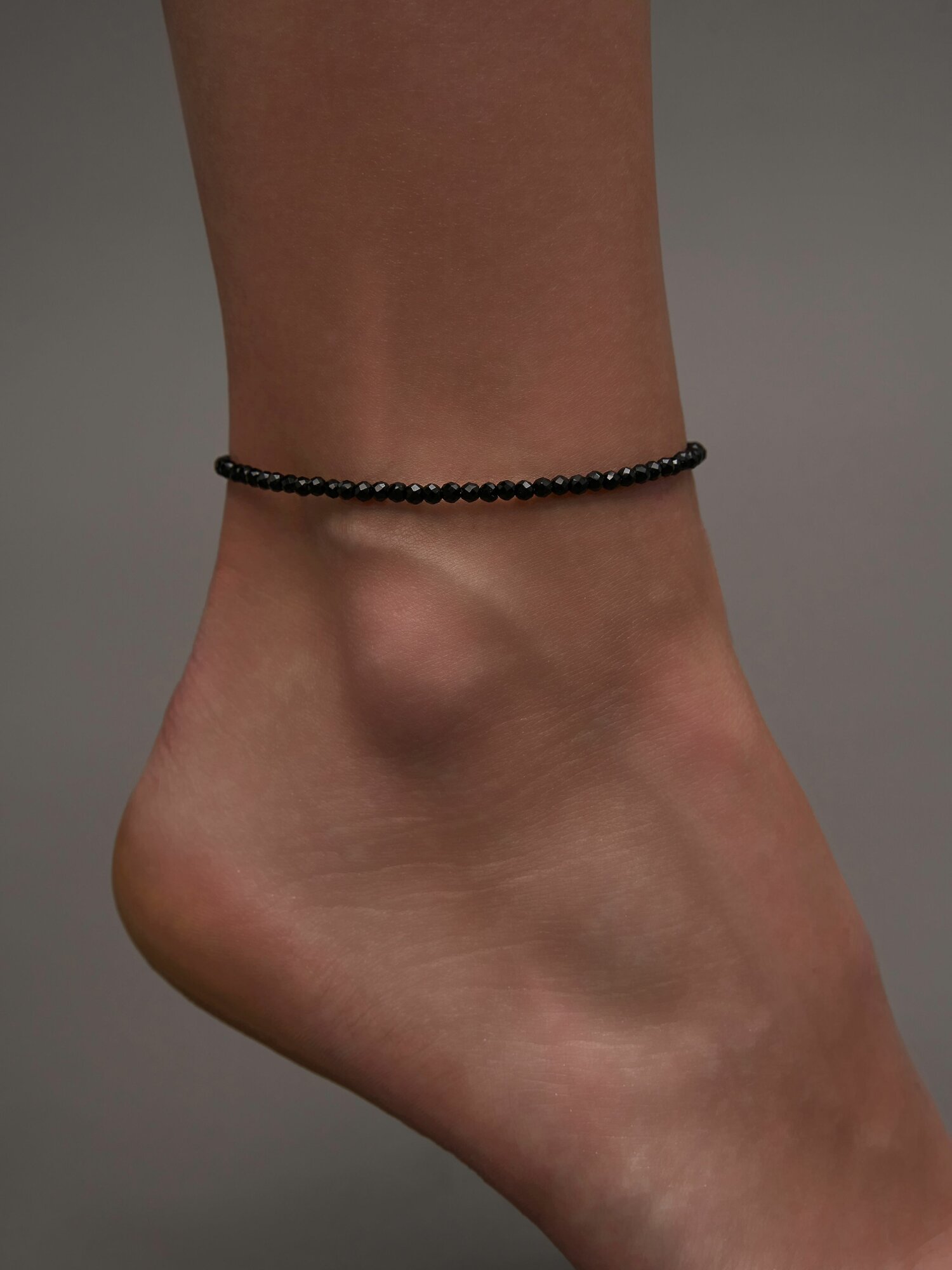 Браслет на ногу, черный — фото 1