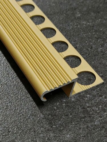 Изображение товара Профиль Z-образный алюминиевый анодированный для плитки на ступени (порог) 10мм 2,7м Золото матовое