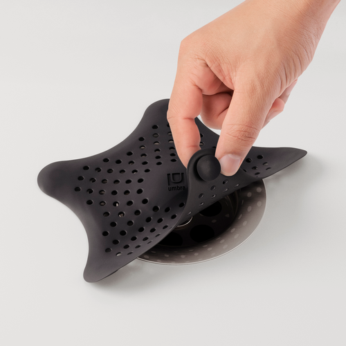 Изображение товара Фильтр для слива Umbra Starfish в форме морской звезды, черный