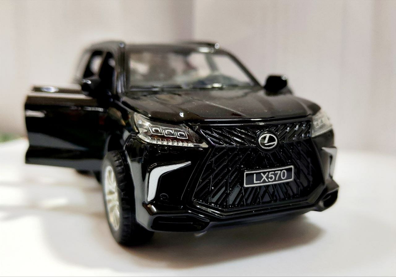 Машинка металлическая игрушка Lexus 1:28 с эффектами