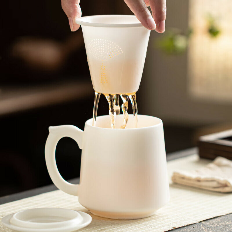 Gold-inlaid jade ice seed jade porcelain office cup tea cup high-end white porcelain home tea water separation with lid tea cup relief rivers