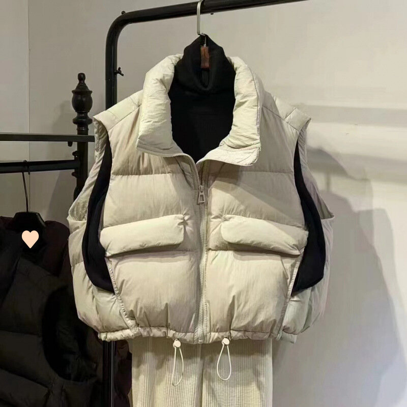 Жилет  размер 42-44 beige